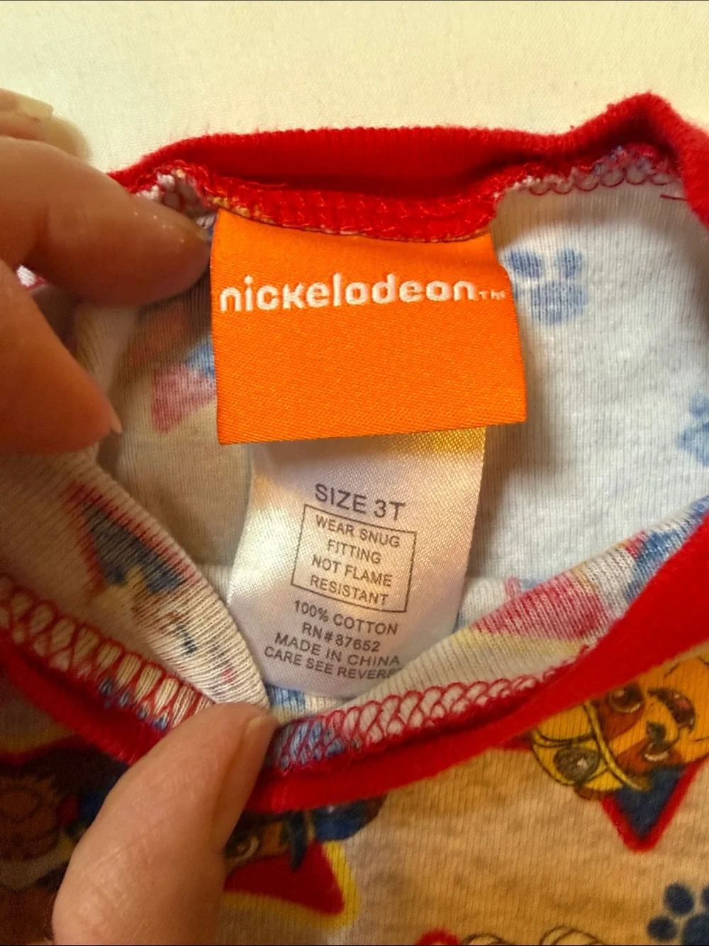 Nickelodeon Red-Trimmed Toddler Top with Colorful Paw Patrol Print 3T